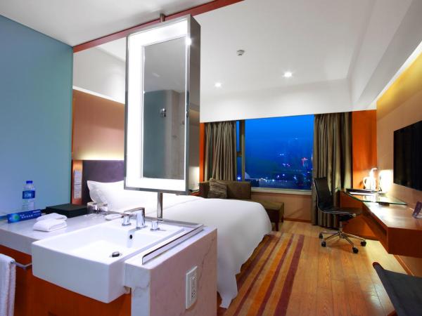 Grand Mercure Dongguan Humen : photo 6 de la chambre chambre lit king-size supérieure