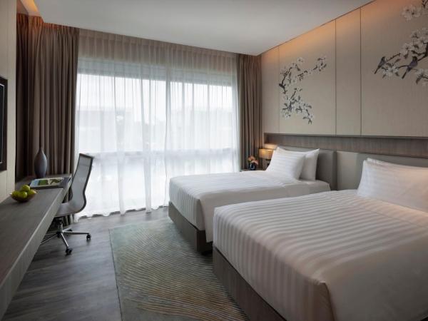 Dusit Thani Laguna Singapore : photo 1 de la chambre hébergement lits jumeaux deluxe laguna