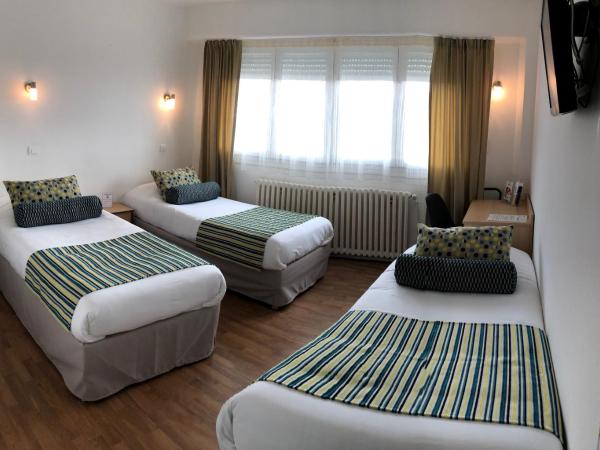 Cit'Hotel Atlantis : photo 1 de la chambre chambre triple avec douche