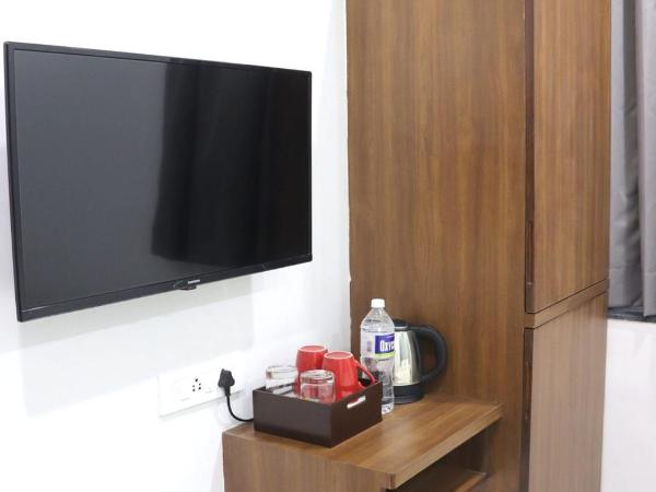 Sharman Suites : photo 9 de la chambre chambre lits jumeaux standard
