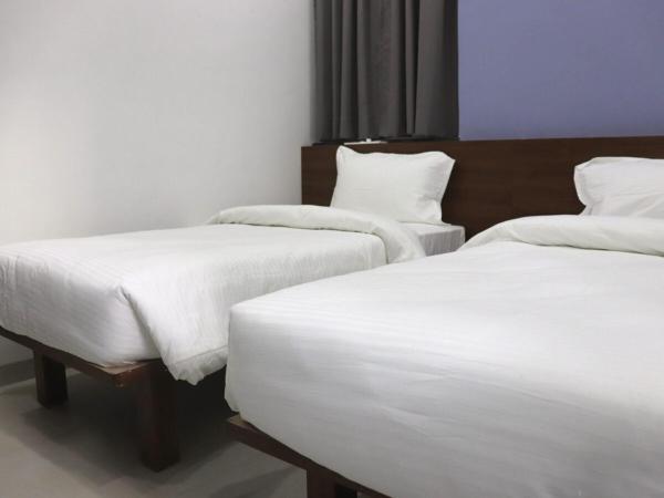 Sharman Suites : photo 2 de la chambre chambre lits jumeaux standard