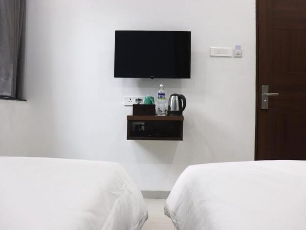 Sharman Suites : photo 3 de la chambre chambre lits jumeaux standard