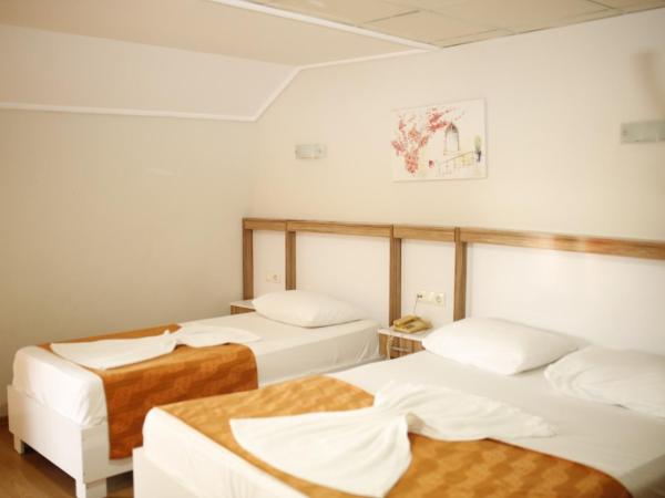 Özhan Hotel : photo 3 de la chambre chambre triple standard