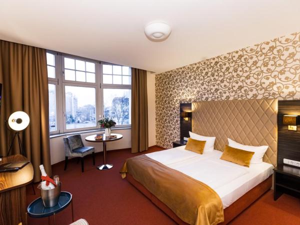 Royal International Leipzig : photo 8 de la chambre chambre simple confort
