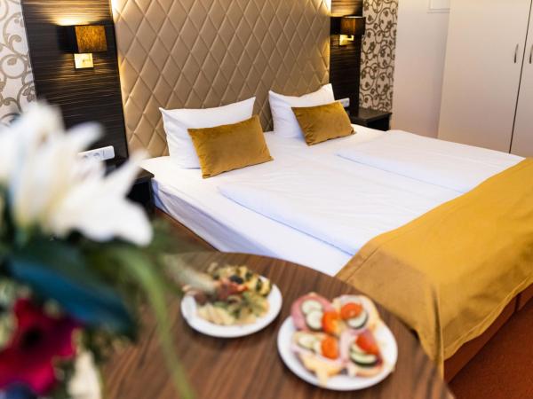 Royal International Leipzig : photo 9 de la chambre chambre simple confort