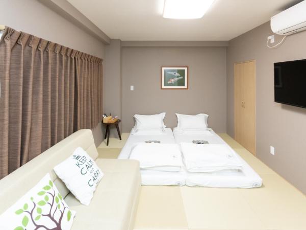 灯光旅館 Light hotel : photo 5 de la chambre chambre quadruple avec salle de bains