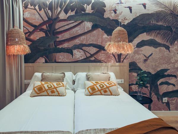 Home42 : photo 10 de la chambre chambre lits jumeaux