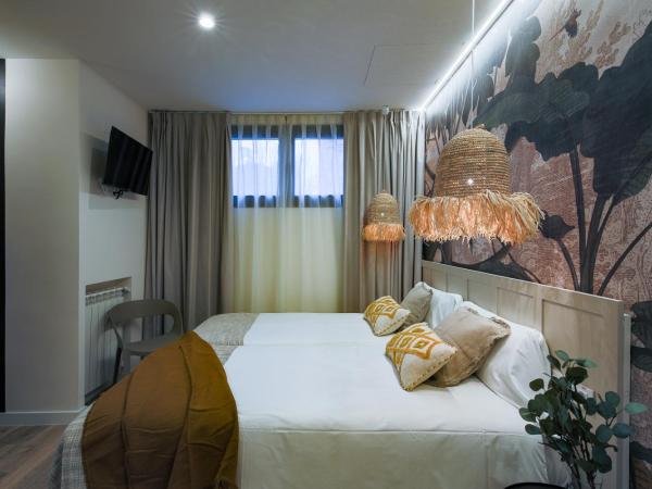 Home42 : photo 8 de la chambre chambre lits jumeaux