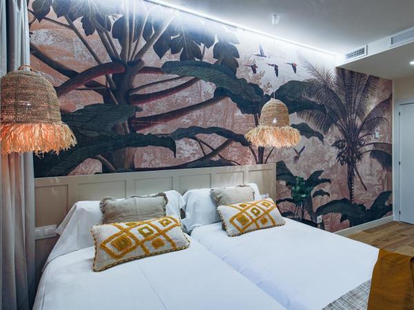 Home42 : photo 7 de la chambre chambre lits jumeaux