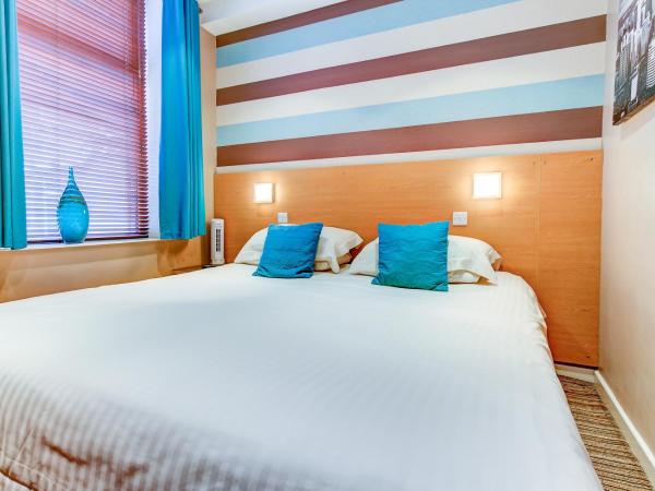 The Craimar : photo 4 de la chambre chambre lits jumeaux avec salle de bains privative