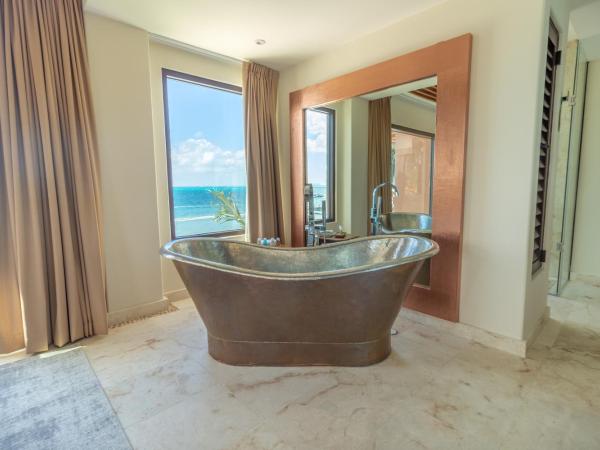 Hotel Beló Isla Mujeres - All Inclusive : photo 7 de la chambre suite présidentielle belo avec 1 lit king-size - vue sur océan