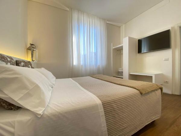 Soggiorno Lo Stellino : photo 3 de la chambre chambre double - vue sur jardin