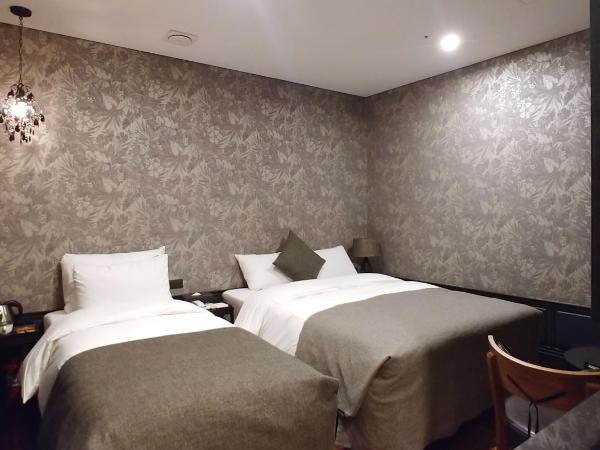 SR Hotel Sadang : photo 1 de la chambre chambre lits jumeaux de luxe 