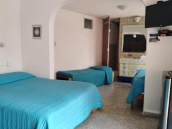 Gal - Habitaciones Confortables : photo 1 de la chambre chambre quadruple avec salle de bains