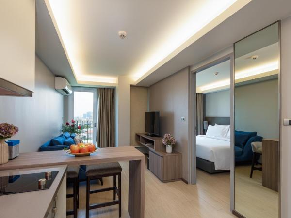 Maitria Hotel Rama 9 Bangkok - A Chatrium Collection : photo 5 de la chambre appartement 1 chambre - vue sur jardin