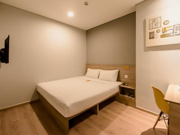 Yellow Bee Tanah Abang : photo 5 de la chambre chambre lit king-size deluxe