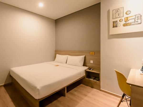 Yellow Bee Tanah Abang : photo 7 de la chambre chambre lit king-size deluxe