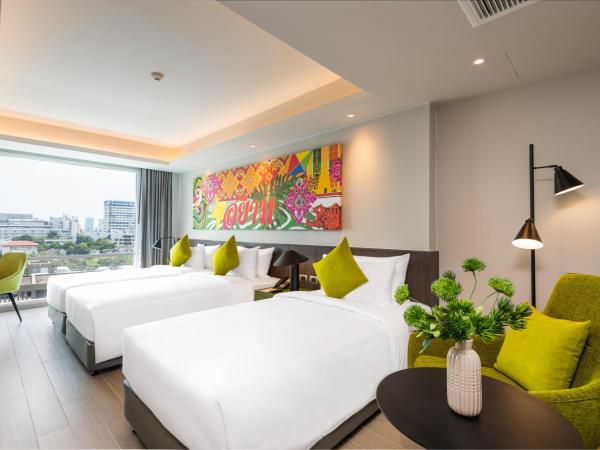 Maitria Hotel Rama 9 Bangkok - A Chatrium Collection : photo 1 de la chambre hébergement triple deluxe - vue sur ville
