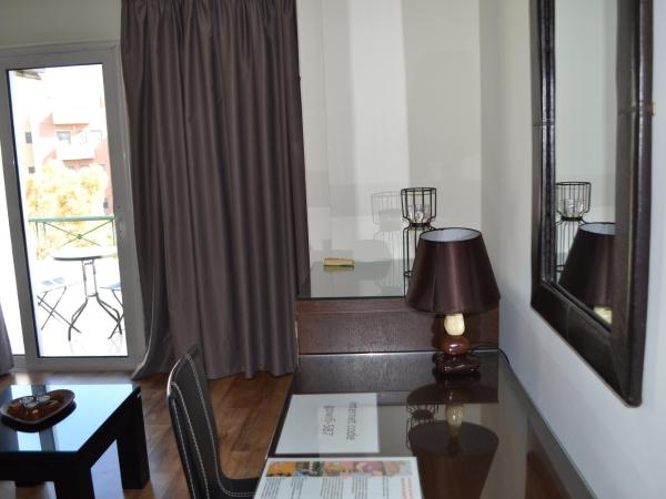 Rivitel Marousi Apartments : photo 8 de la chambre appartement avec balcon