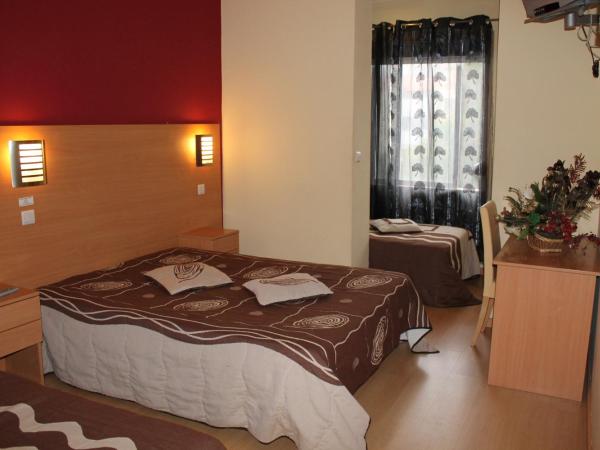 Guest House Estrela : photo 1 de la chambre chambre quadruple