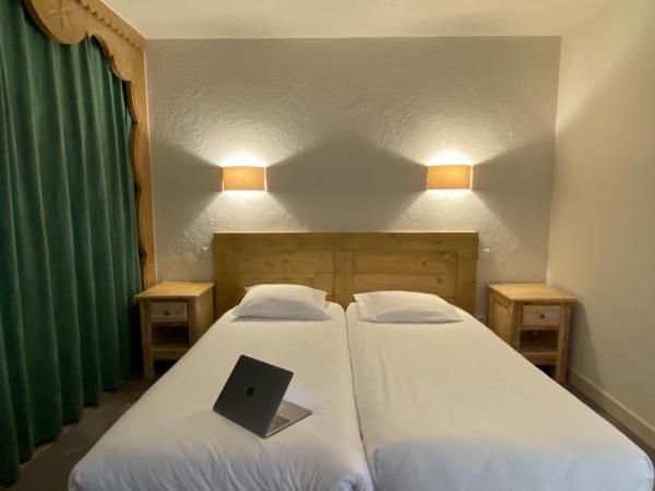 Hotel Le Portillo : photo 6 de la chambre chambre quadruple