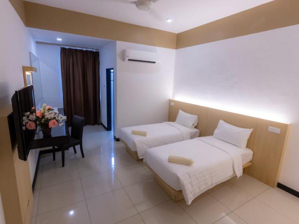 Scott Service Suites : photo 2 de la chambre chambre lits jumeaux standard