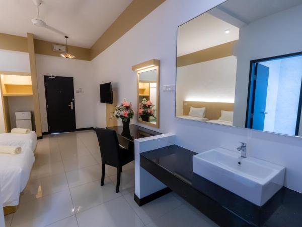 Scott Service Suites : photo 5 de la chambre chambre lits jumeaux standard