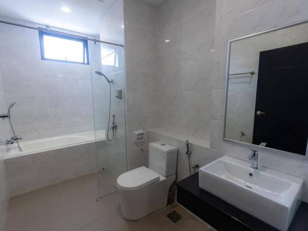 Scott Service Suites : photo 7 de la chambre chambre familiale avec baignoire