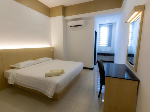 Scott Service Suites : photo 1 de la chambre chambre familiale