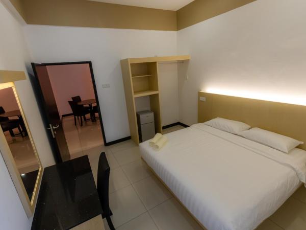 Scott Service Suites : photo 2 de la chambre chambre familiale