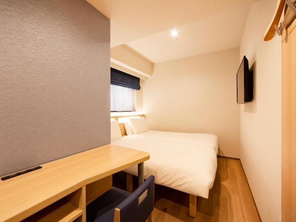 karaksa hotel TOKYO STATION : photo 2 de la chambre chambre lits jumeaux hollywood