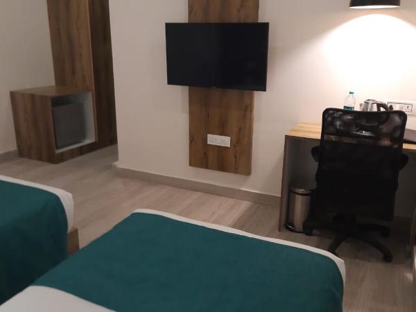 Regenta INN Grand Koramangala by Royal Orchid Hotels : photo 10 de la chambre chambre lits jumeaux standard