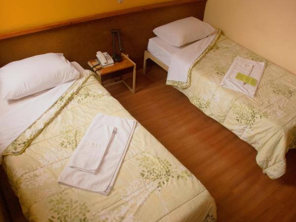 Hara Palace Hotel : photo 1 de la chambre chambre double standard avec 2 lits simples