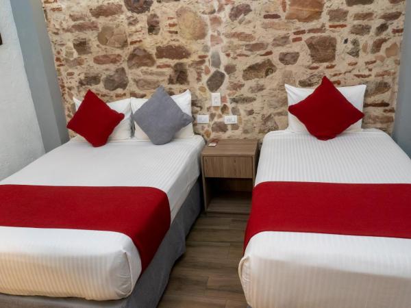 Hotel Hidalgo : photo 2 de la chambre petite chambre lits jumeaux