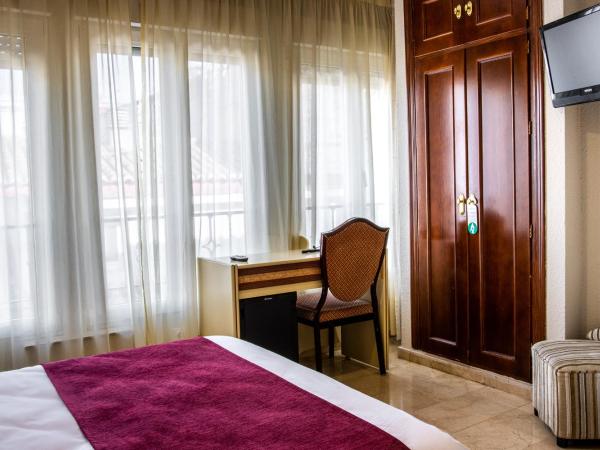 Hotel Reina Cristina : photo 4 de la chambre chambre lits jumeaux à occupation simple