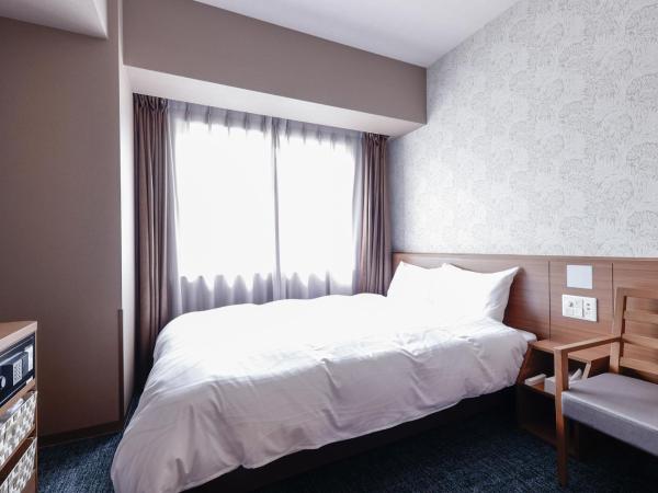 Dormy Inn Kobe Motomachi Natural Hot Springs : photo 1 de la chambre chambre double standard