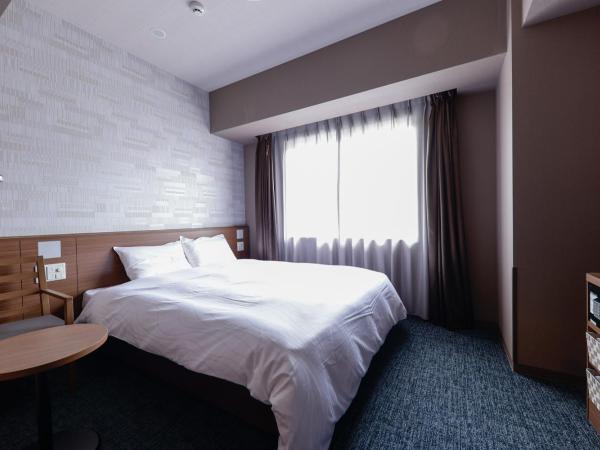 Dormy Inn Kobe Motomachi Natural Hot Springs : photo 1 de la chambre chambre standard lit queen-size