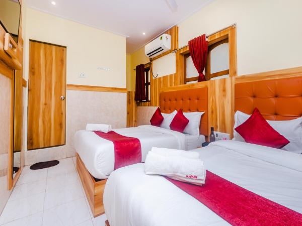Aman Hotel near CST : photo 8 de la chambre four bed ac