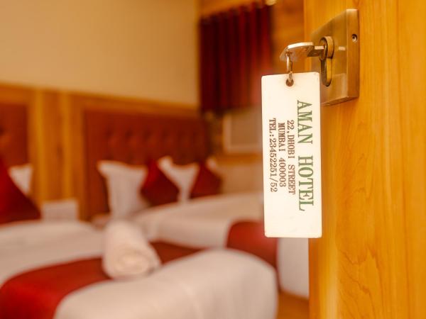 Aman Hotel near CST : photo 10 de la chambre triple bed ac
