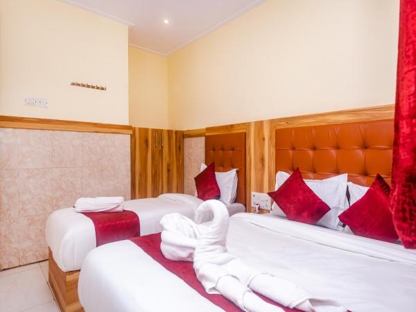 Aman Hotel near CST : photo 7 de la chambre triple bed ac