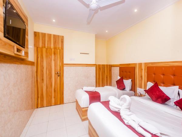 Aman Hotel near CST : photo 5 de la chambre triple bed ac