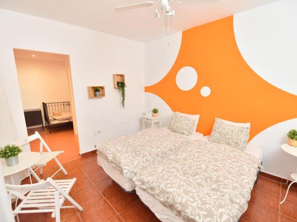 La Casa Mata Central : photo 1 de la chambre chambre triple avec salle de bains privative