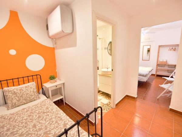 La Casa Mata Central : photo 2 de la chambre chambre triple avec salle de bains privative