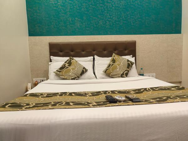 Hotel Golden Nest Popular Residency : photo 10 de la chambre chambre double deluxe