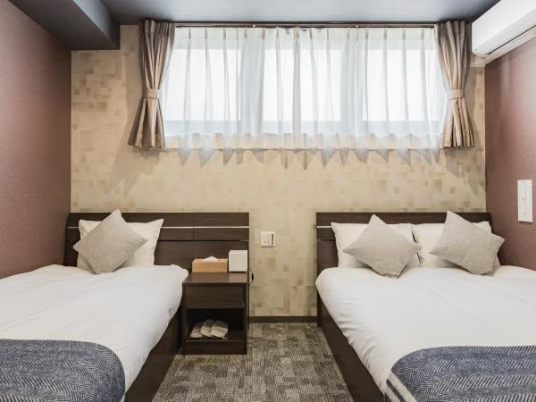 Playsis Asakusa : photo 4 de la chambre chambre lits jumeaux