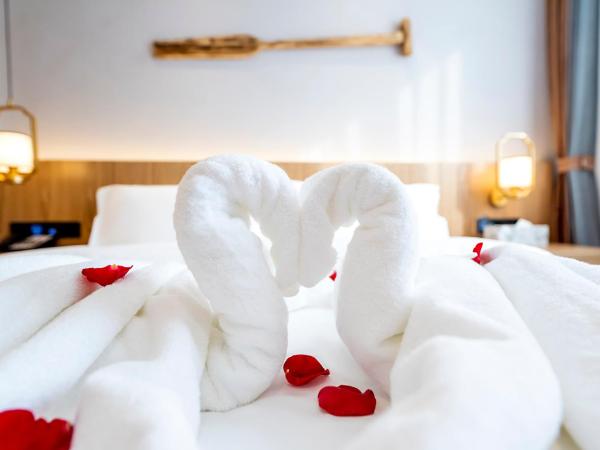 Happy Dragon Universal Vacation Hotel - close to Universal Studio and Wanda Plaza,free pick up to the studio,Free Coffee,Laundry : photo 9 de la chambre chambre lit queen-size deluxe