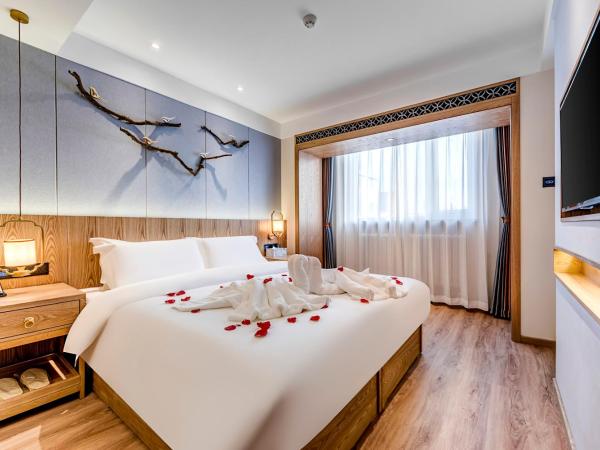 Happy Dragon Universal Vacation Hotel - close to Universal Studio and Wanda Plaza,free pick up to the studio,Free Coffee,Laundry : photo 10 de la chambre chambre lit queen-size deluxe