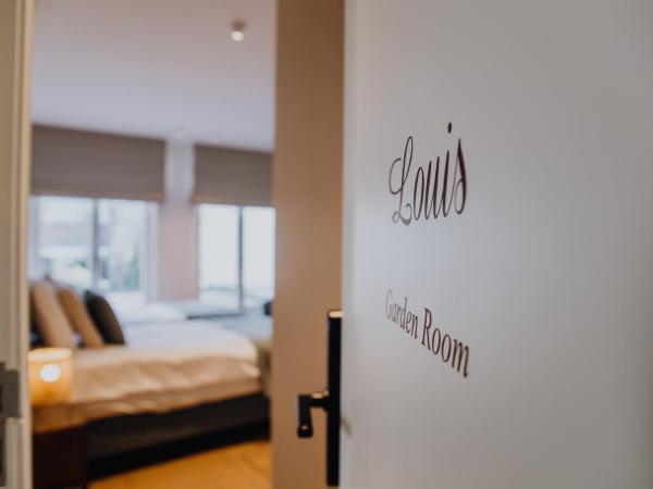 B&B Anna9 : photo 6 de la chambre chambre lits jumeaux jardin - 24 m2