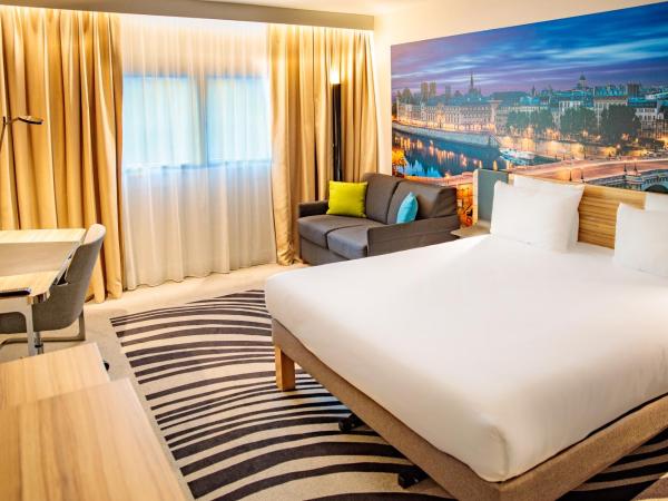 Novotel Paris 14 Porte d'Orléans : photo 2 de la chambre chambre lit queen-size supérieure avec canapé-lit 1 place