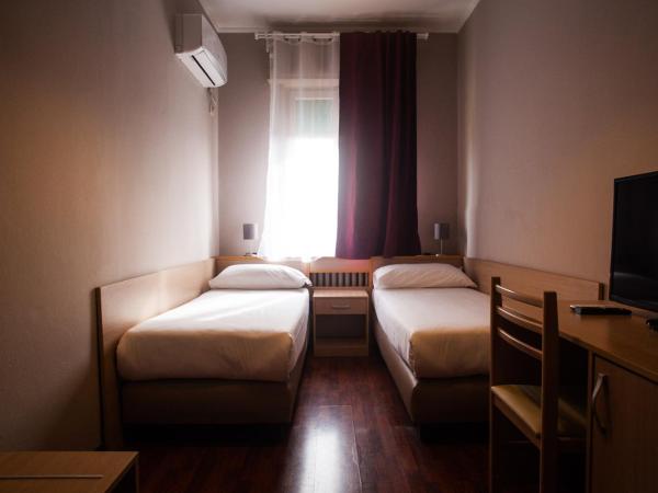 Hotel di Porta Romana : photo 1 de la chambre chambre lits jumeaux